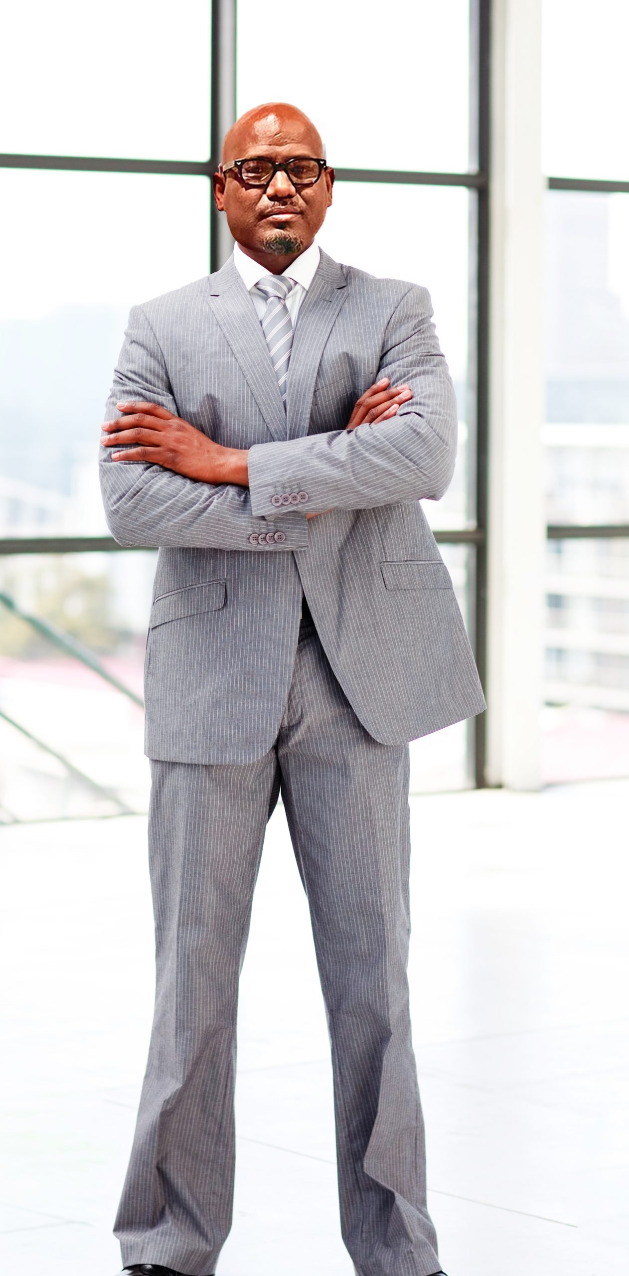 Mulualem Hagos standing in a professional setting